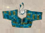 Shop sea green and blue choli-cut saree blouse online in USA with lace. Elevate your saree style with exquisite readymade sari blouses, embroidered saree blouses, Banarasi sari blouse, designer saree blouse, choli-cut blouses, corset blouses from Pure Elegance Indian fashion store in USA.-full view