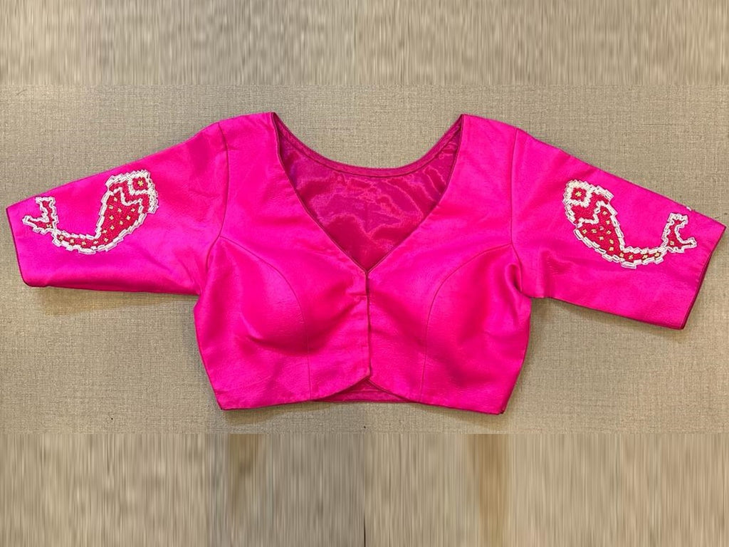 Shop fuschia pink saree blouse online in USA with embroidered back. Elevate your saree style with exquisite readymade sari blouses, embroidered saree blouses, Banarasi sari blouse, designer saree blouse, choli-cut blouses, corset blouses from Pure Elegance Indian fashion store in USA.-front