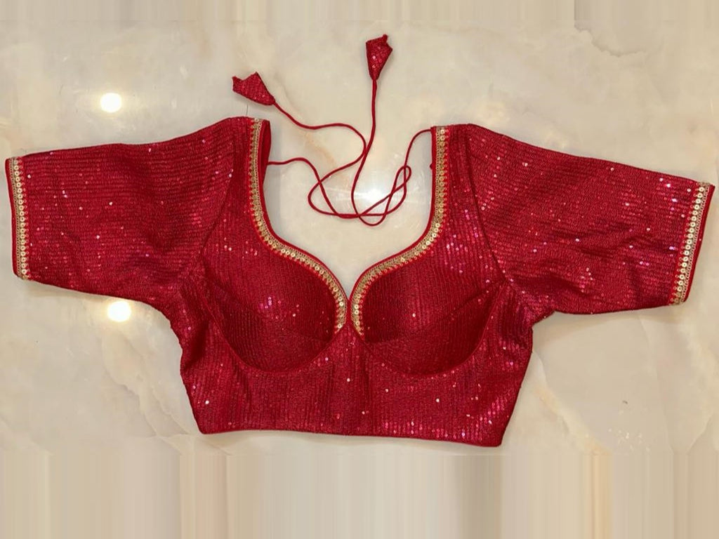 Shop stunning dark pink sequin work choli-cut saree blouse online in USA. Elevate your saree style with exquisite readymade sari blouses, embroidered saree blouses, Banarasi sari blouse, designer saree blouse, choli-cut blouses, corset blouses from Pure Elegance Indian fashion store in USA.-front