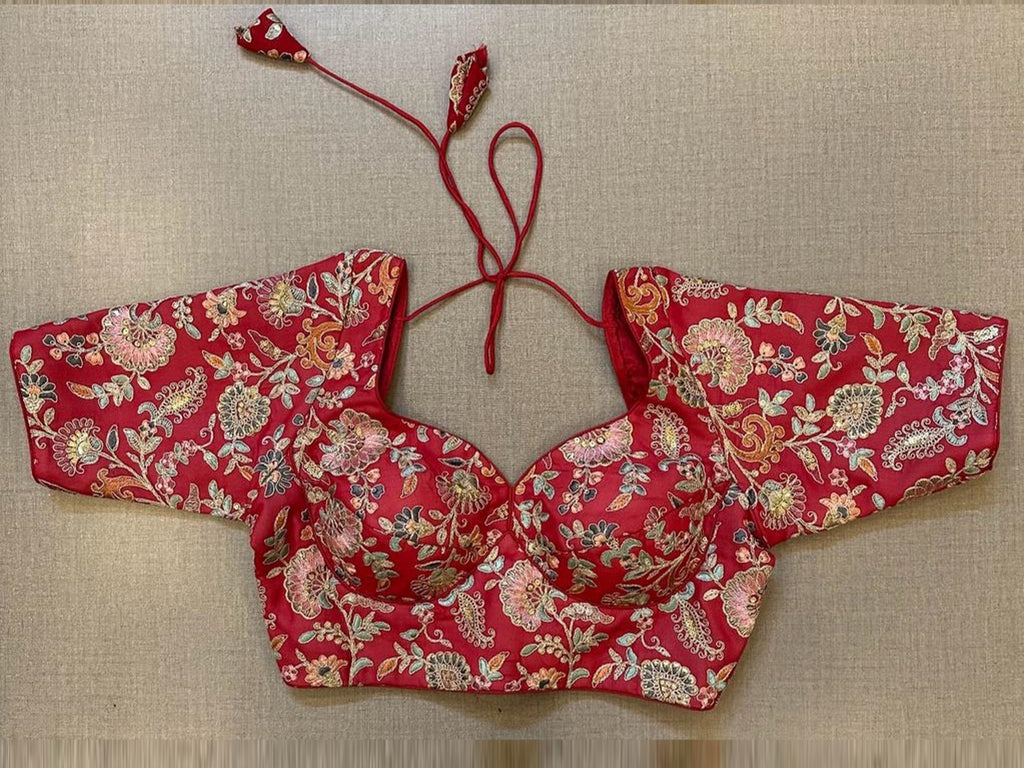 Shop stunning red embroidered choli cut blouse online in USA. Elevate your saree style with exquisite readymade sari blouses, embroidered saree blouses, Banarasi sari blouse, designer saree blouse, choli-cut blouses, corset blouses from Pure Elegance Indian fashion store in USA.-front