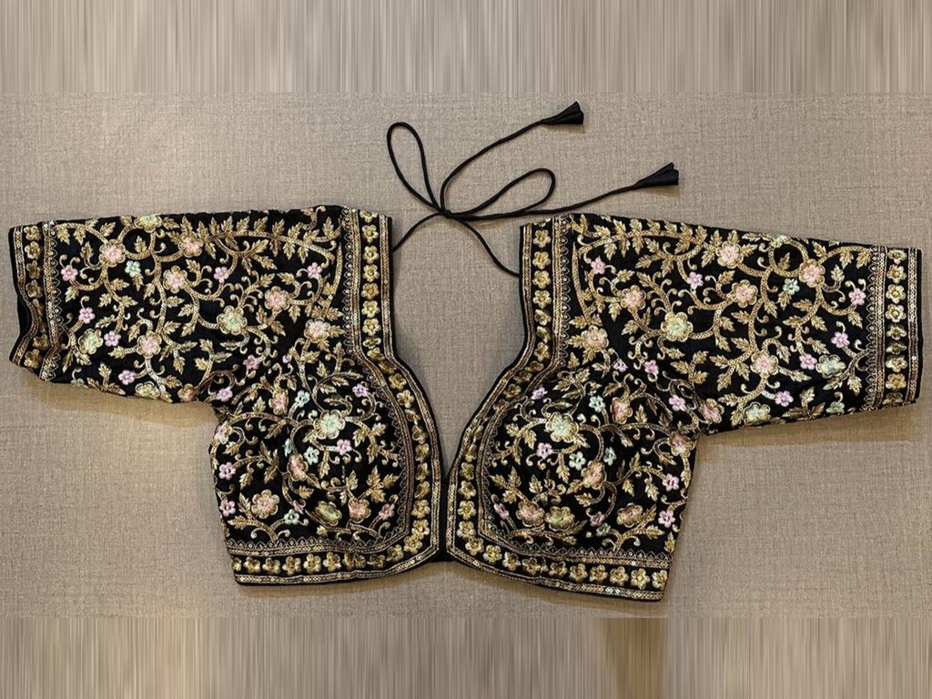 Buy black embroidered saree blouse online in USA with elbow sleeves. Elevate your saree style with exquisite readymade sari blouses, embroidered saree blouses, Banarasi sari blouse, designer saree blouse, choli-cut blouses, corset blouses from Pure Elegance Indian fashion store in USA.-full view