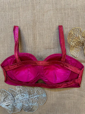 Shop pink metallic strappy designer saree blouse online in USA. Elevate your saree style with exquisite readymade sari blouses, embroidered saree blouses, Banarasi sari blouse, designer saree blouse, choli-cut blouses, corset blouses from Pure Elegance Indian fashion store in USA.-back