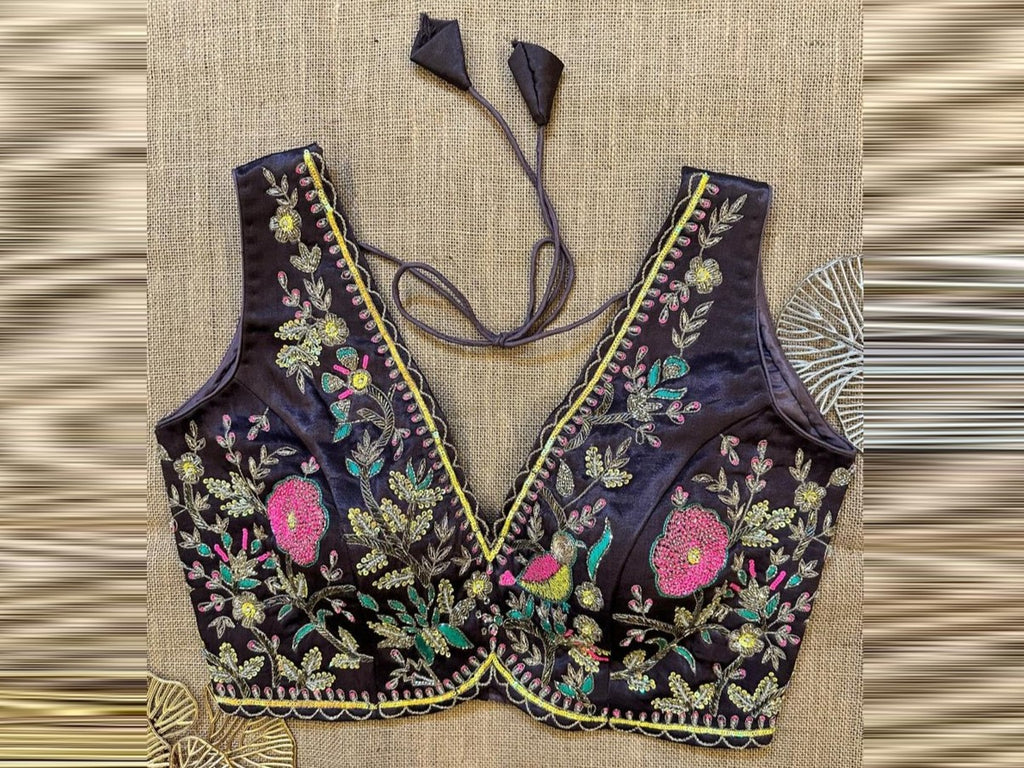 Buy purple embroidered sleeveless blouse online in USA with v-neckline. Elevate your saree style with exquisite readymade saree blouses, embroidered saree blouses, Banarasi sari blouse, designer saree blouse, choli-cut blouses, corset blouses from Pure Elegance Indian fashion store in USA.-front