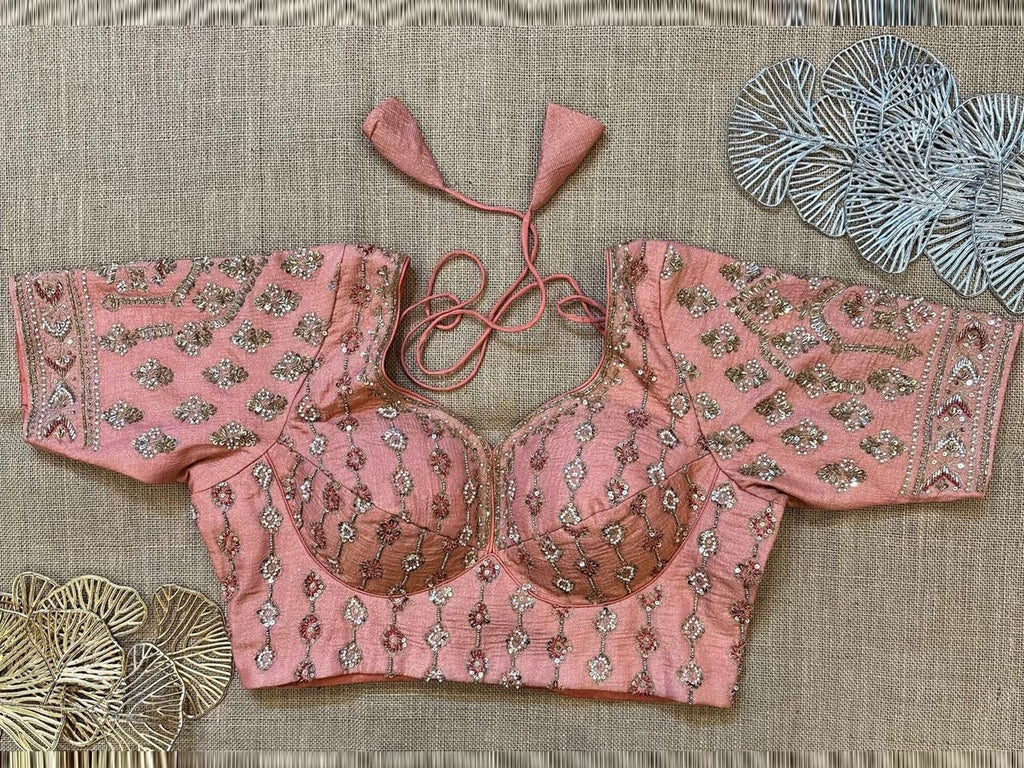 Buy dusty pink choli cut heavy embroidery sari blouse online in USA. Elevate your saree style with exquisite readymade saree blouses, embroidered saree blouses, Banarasi sari blouse, designer saree blouse, choli-cut blouses, corset blouses from Pure Elegance Indian fashion store in USA.-front