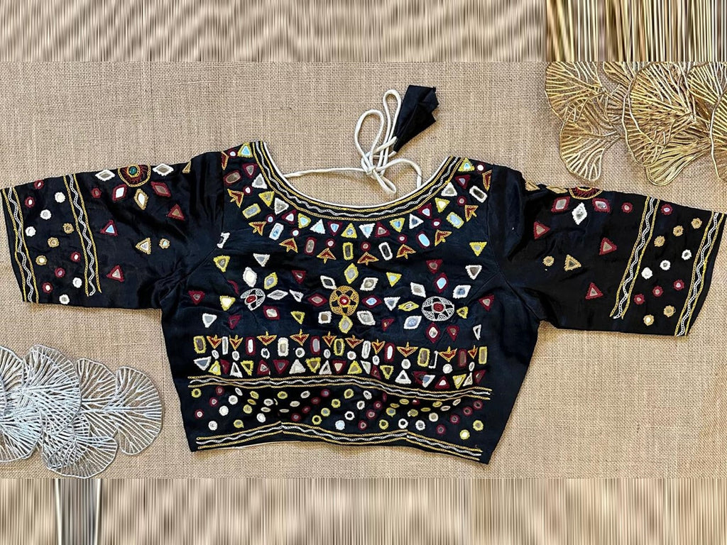 Buy black multicolor thread and mirror work blouse online in USA. Elevate your saree style with exquisite readymade saree blouses, embroidered saree blouses, Banarasi sari blouse, designer saree blouse, choli-cut blouses, corset blouses from Pure Elegance Indian fashion store in USA.-front