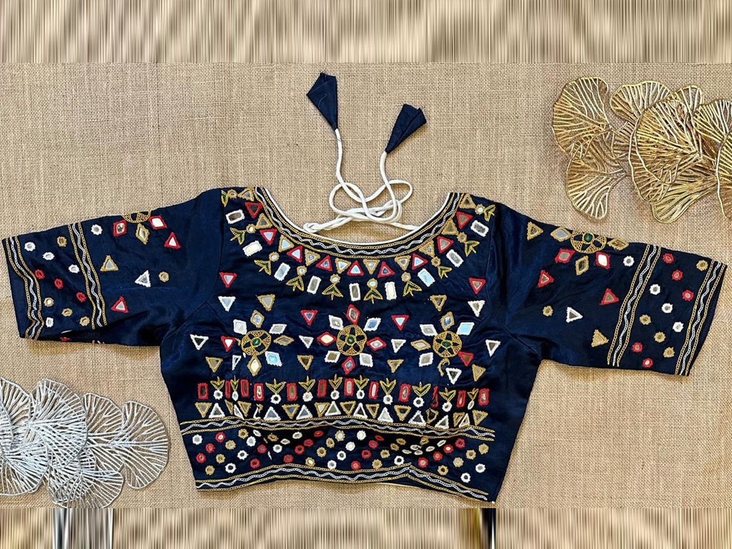 Shop stunning navy blue mirror work sari blouse online in USA. Elevate your saree style with exquisite readymade saree blouses, embroidered saree blouses, Banarasi sari blouse, designer saree blouse, choli-cut blouses, corset blouses from Pure Elegance Indian fashion store in USA.-front