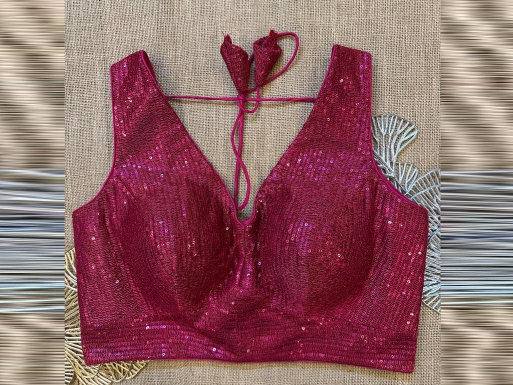 Buy dark pink sleeveless blouse online in USA with sequin embroidery. Elevate your saree style with exquisite readymade saree blouses, embroidered saree blouses, Banarasi sari blouse, designer saree blouse, choli-cut blouses, corset blouses from Pure Elegance Indian fashion store in USA.-front