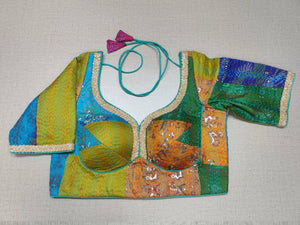 Shop multicolor print Kantha stitch saree blouse online in USA with golden lace. Elevate your saree style with exquisite readymade saree blouses, embroidered saree blouses, Banarasi sari blouse, designer saree blouse, choli-cut blouses, corset blouses from Pure Elegance Indian fashion store in USA.-full view