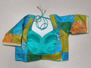 Shop multicolor print Kantha stitch saree blouse online in USA with golden lace. Elevate your saree style with exquisite readymade saree blouses, embroidered saree blouses, Banarasi sari blouse, designer saree blouse, choli-cut blouses, corset blouses from Pure Elegance Indian fashion store in USA.-back