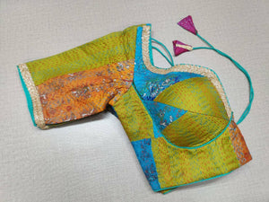 Shop multicolor print Kantha stitch saree blouse online in USA with golden lace. Elevate your saree style with exquisite readymade saree blouses, embroidered saree blouses, Banarasi sari blouse, designer saree blouse, choli-cut blouses, corset blouses from Pure Elegance Indian fashion store in USA.-side