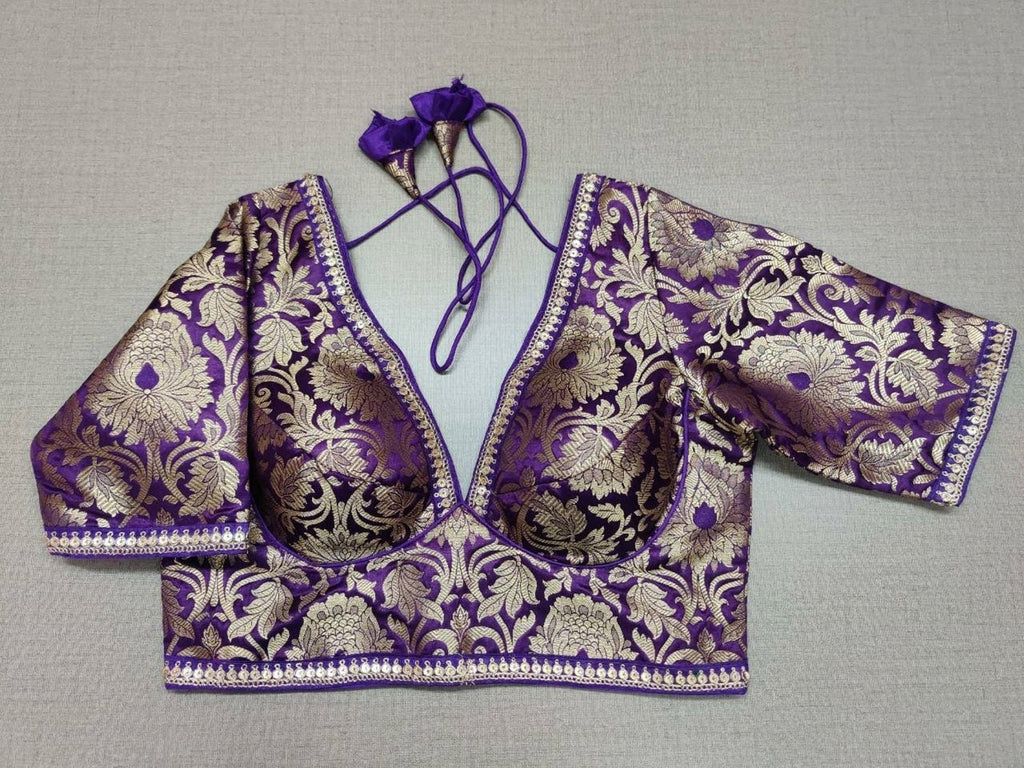 Shop purple Banarasi minakari blouse online in USA with sequin lace. Elevate your saree style with exquisite readymade saree blouses, embroidered saree blouses, Banarasi saree blouse, designer sari blouse, choli-cut blouses, corset blouses from Pure Elegance Indian fashion store in USA.-full view
