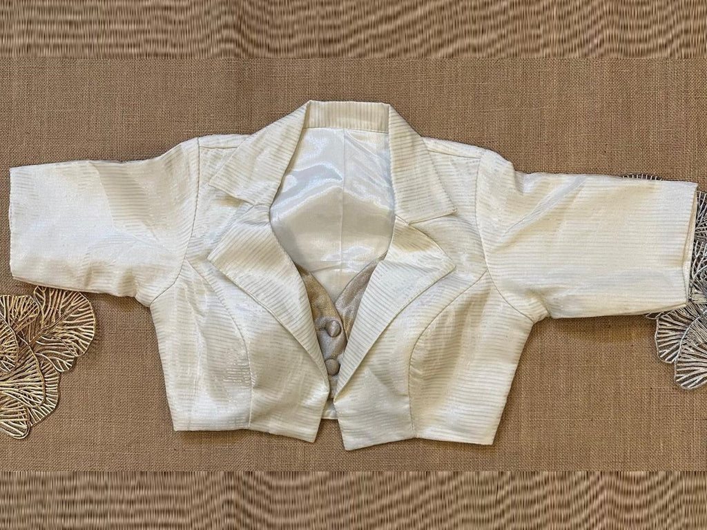 Buy white and golden striped tissue jacket blouse online in USA. Elevate your saree style with exquisite readymade saree blouses, embroidered saree blouses, Banarasi saree blouse, designer sari blouse, choli-cut blouses, corset blouses from Pure Elegance Indian fashion store in USA.-full view