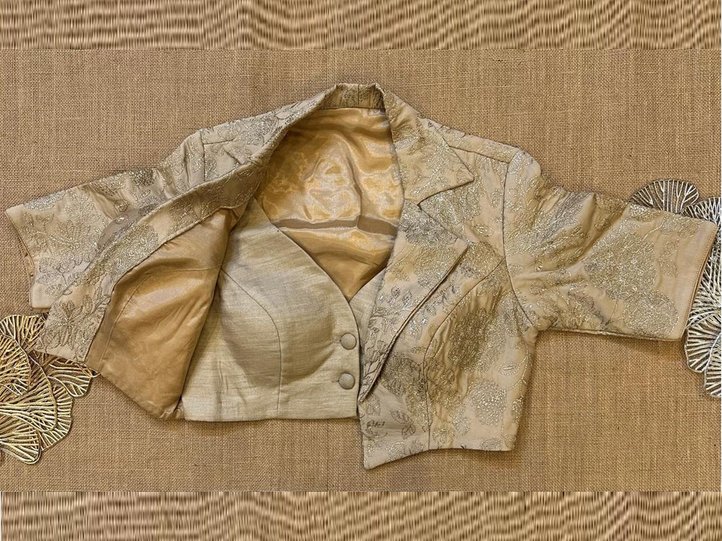 Shop golden embroidered designer jacket blouse online in USA. Elevate your saree style with exquisite readymade saree blouses, embroidered saree blouses, Banarasi saree blouse, designer sari blouse, choli-cut blouses, corset blouses from Pure Elegance Indian fashion store in USA.-full view