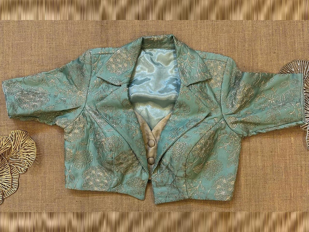 Buy stunning light blue embroidered jacket blouse online in USA. Elevate your saree style with exquisite readymade saree blouses, embroidered saree blouses, Banarasi saree blouse, designer sari blouse, choli-cut blouses, corset blouses from Pure Elegance Indian fashion store in USA.-full view
