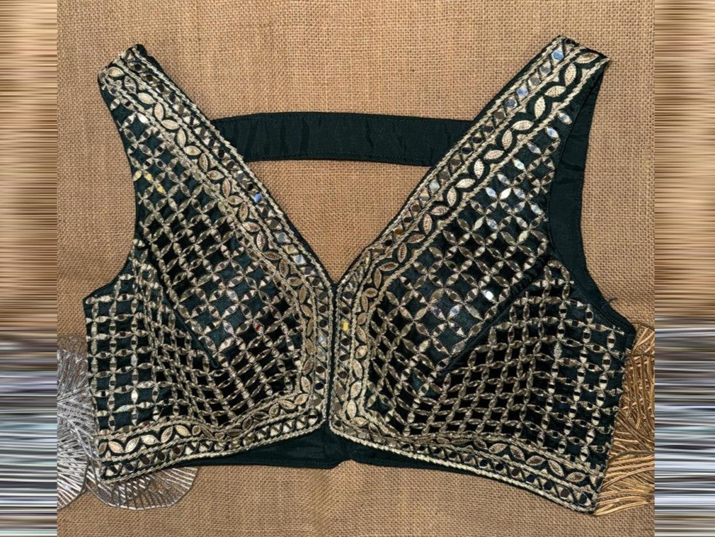 Shop green sleeveless blouse online in USA with purple embroidery. Elevate your sarees with exquisite readymade saree blouses, designer sari blouse, choli-cut blouses.-full view