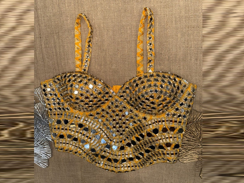 Buy yellow mirror work strappy corset blouse online in USA. Elevate your sarees with exquisite readymade saree blouses, designer sari blouse, choli-cut blouses.-full view