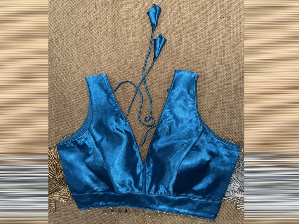 Shop blue sleeveless blouse online in USA with mirror tassels. Elevate your sarees with readymade saree blouses, designer sari blouse, choli-cut blouses.-full view