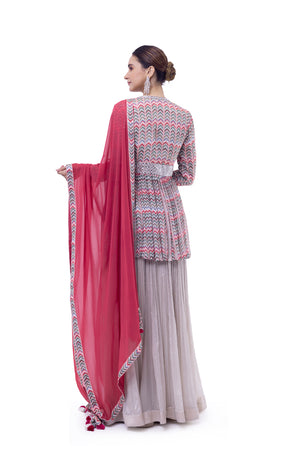 Buy beautiful beige chiffon peplum sharara suit online in USA with pink dupatta. Shop the best and latest designs in embroidered sarees, designer sarees, Anarkali suit, lehengas, sharara suits for weddings and special occasions from Pure Elegance Indian fashion store in USA.-back