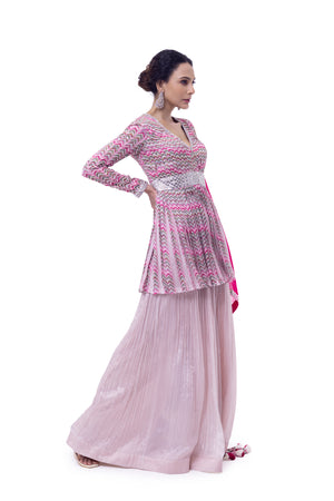 Shop pink printed chiffon peplum sharara suit online in USA with rani dupatta. Shop the best and latest designs in embroidered sarees, designer sarees, Anarkali suit, lehengas, sharara suits for weddings and special occasions from Pure Elegance Indian fashion store in USA.-side