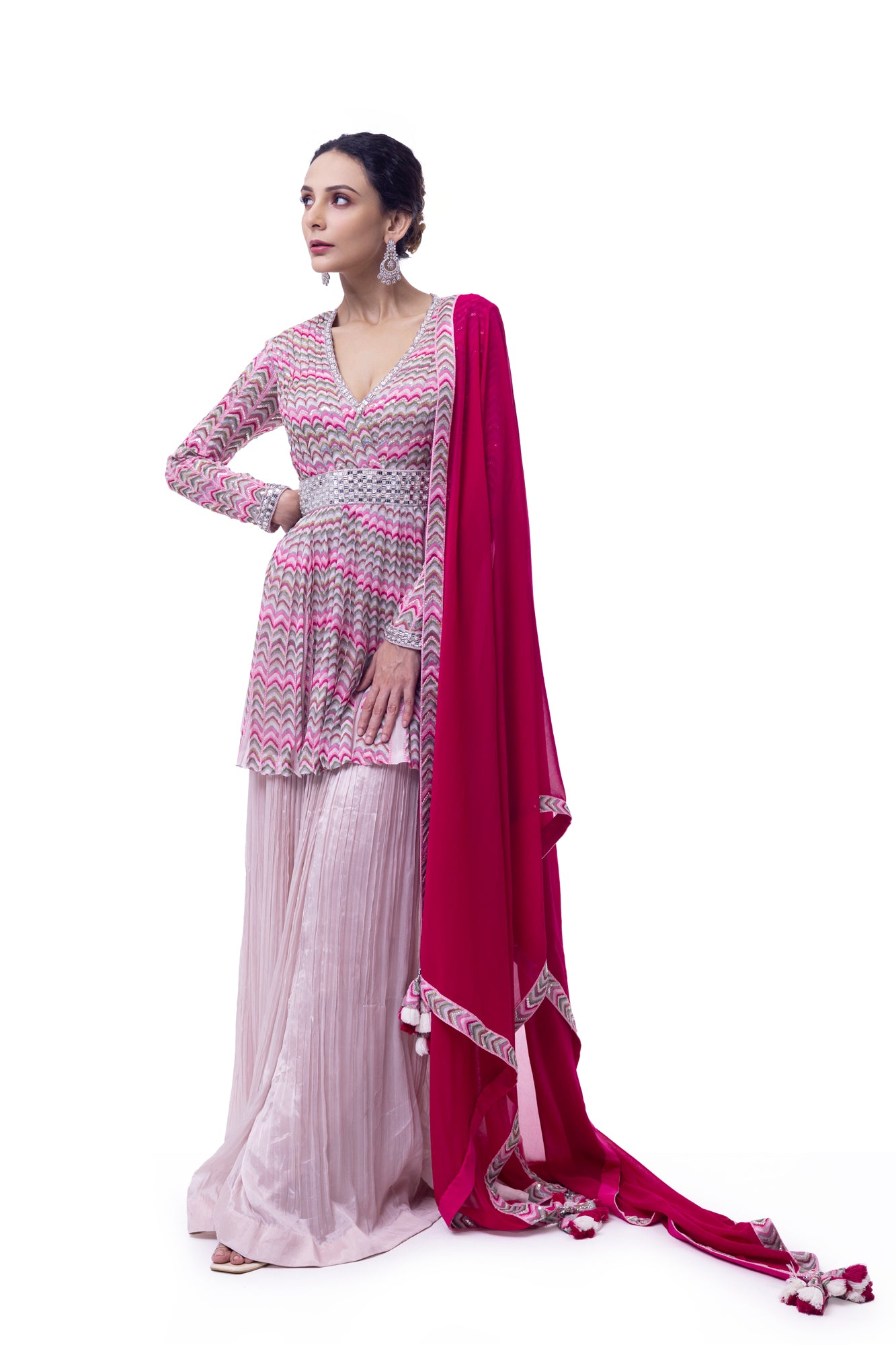 Shop pink printed chiffon peplum sharara suit online in USA with rani dupatta. Shop the best and latest designs in embroidered sarees, designer sarees, Anarkali suit, lehengas, sharara suits for weddings and special occasions from Pure Elegance Indian fashion store in USA.-front