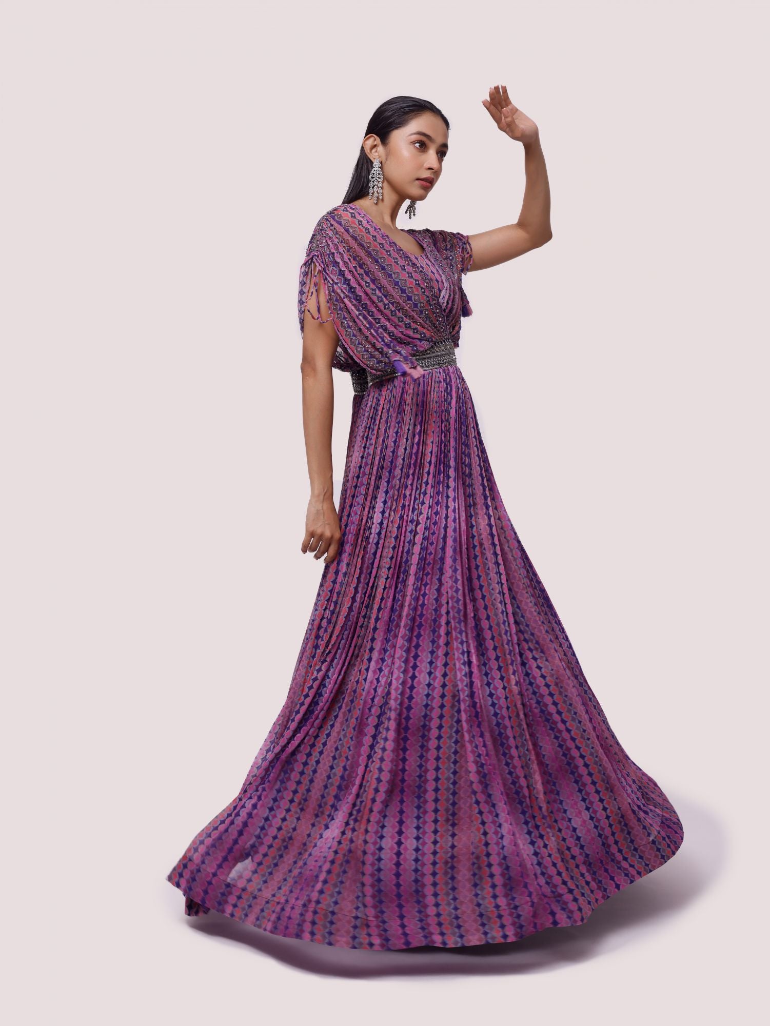Buy purple printed cutdana and sequin work georgette gown online in USA. Shop the best and latest designs in embroidered sarees, designer sarees, Anarkali suit, lehengas, sharara suits for weddings and special occasions from Pure Elegance Indian fashion store in USA.-side