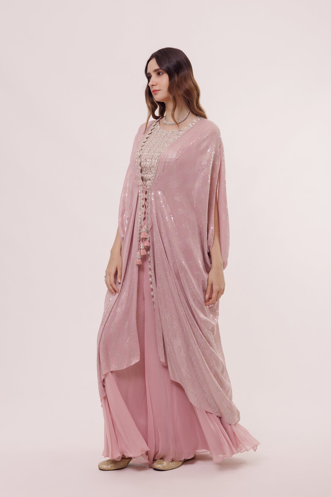 Shop stunning dusty pink palazzo set online in USA with drape. Shop the best and latest designs in embroidered sarees, designer sarees, Anarkali suit, lehengas, sharara suits for weddings and special occasions from Pure Elegance Indian fashion store in USA.-palazzo