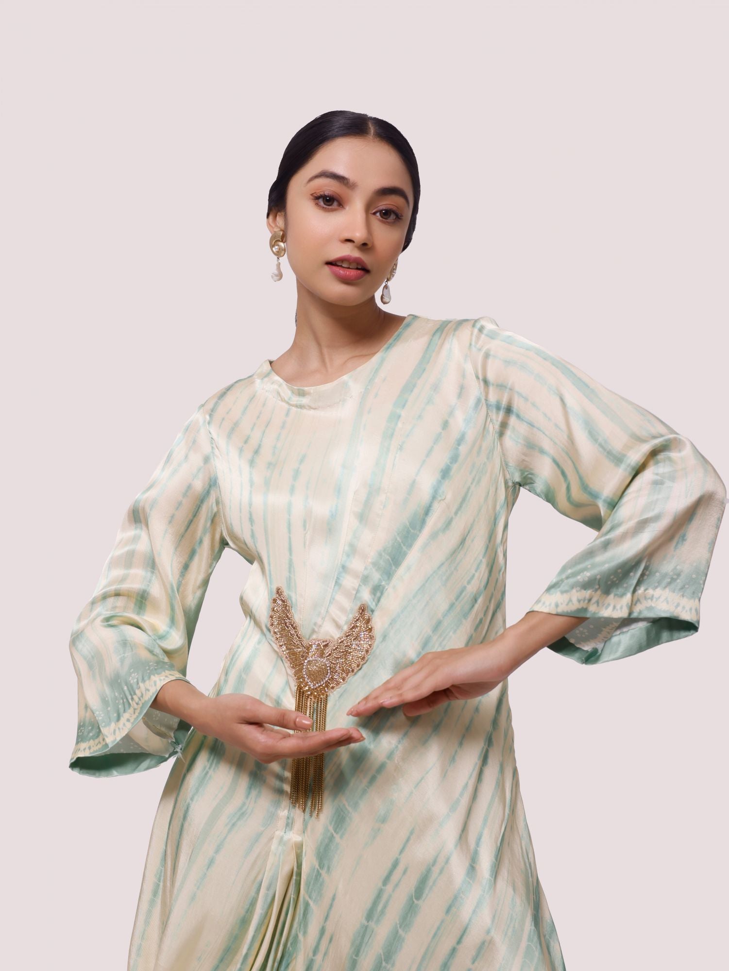 Buy beautiful pista green and cream printed satin kurta set online in USA. Shop the best and latest designs in embroidered sarees, designer sarees, Anarkali suit, lehengas, sharara suits for weddings and special occasions from Pure Elegance Indian fashion store in USA.-closeup