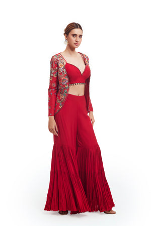 Buy beautiful red silk gharara set online in USA with embroidered silk jacket. Shop the best and latest designs in embroidered sarees, designer sarees, Anarkali suit, lehengas, sharara suits for weddings and special occasions from Pure Elegance Indian fashion store in USA.-side