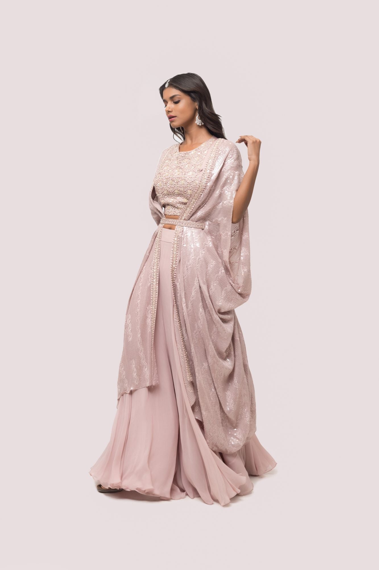 Buy mauve embellished palazzo set online in USA with cape. Shop the best and latest designs in embroidered sarees, designer sarees, Anarkali suit, lehengas, sharara suits for weddings and special occasions from Pure Elegance Indian fashion store in USA.-palazzo