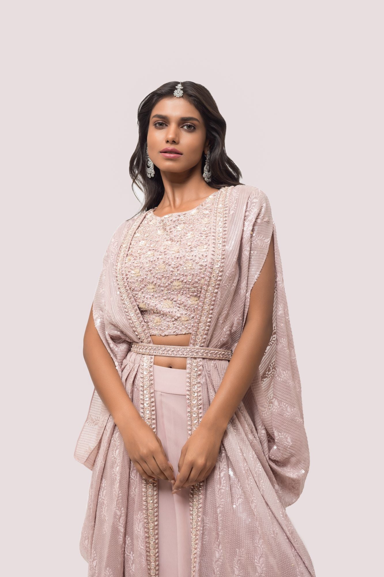 Buy mauve embellished palazzo set online in USA with cape. Shop the best and latest designs in embroidered sarees, designer sarees, Anarkali suit, lehengas, sharara suits for weddings and special occasions from Pure Elegance Indian fashion store in USA.-closeup
