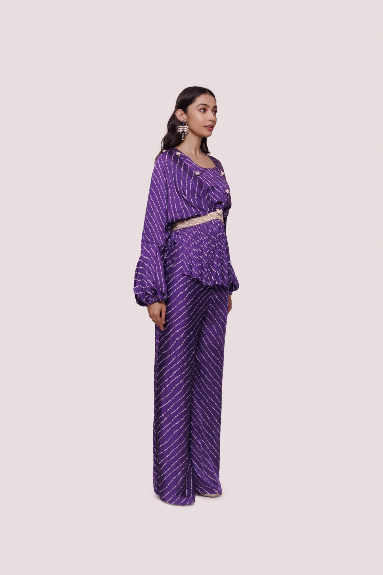 Shop stunning purple bandhej print satin palazzo set online in USA. Shop the best and latest designs in embroidered sarees, designer sarees, Anarkali suit, lehengas, sharara suits for weddings and special occasions from Pure Elegance Indian fashion store in USA.-side