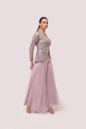 Buy lavender organza embroidered flared pant set online in USA. Shop the best and latest designs in embroidered sarees, designer sarees, Anarkali suit, lehengas, sharara suits for weddings and special occasions from Pure Elegance Indian fashion store in USA.-side