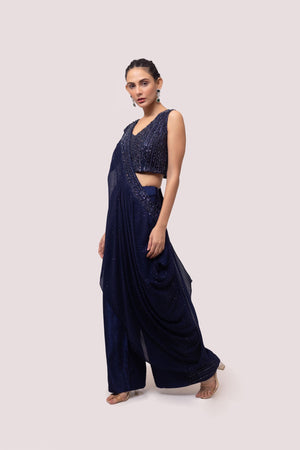 Shop beautiful navy blue embroidered silk chikan palazzo set online in USA. Shop the best and latest designs in embroidered sarees, designer sarees, Anarkali suit, lehengas, sharara suits for weddings and special occasions from Pure Elegance Indian fashion store in USA.-left