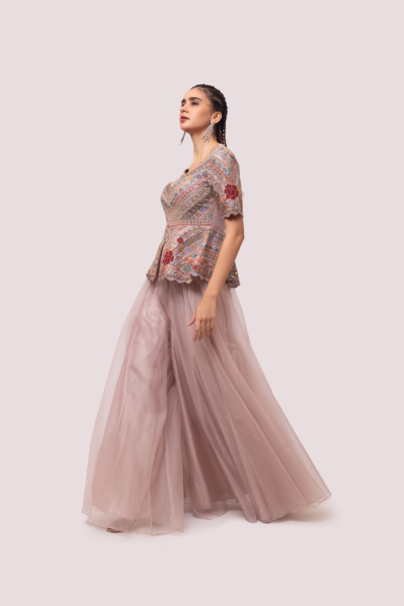 Buy dusty pink embellished palazzo set online in USA. Shop the best and latest designs in embroidered sarees, designer sarees, Anarkali suit, lehengas, sharara suits for weddings and special occasions from Pure Elegance Indian fashion store in USA.-left