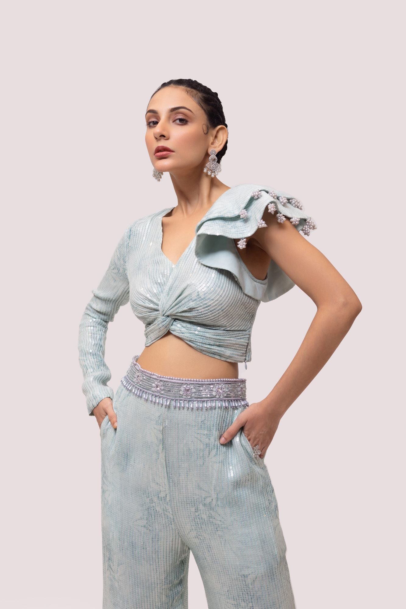 Shop beautiful aqua blue contemporary sequinned co-ord set online in USA. Shop the best and latest designs in embroidered sarees, designer sarees, Anarkali suit, lehengas, sharara suits for weddings and special occasions from Pure Elegance Indian fashion store in USA.-top