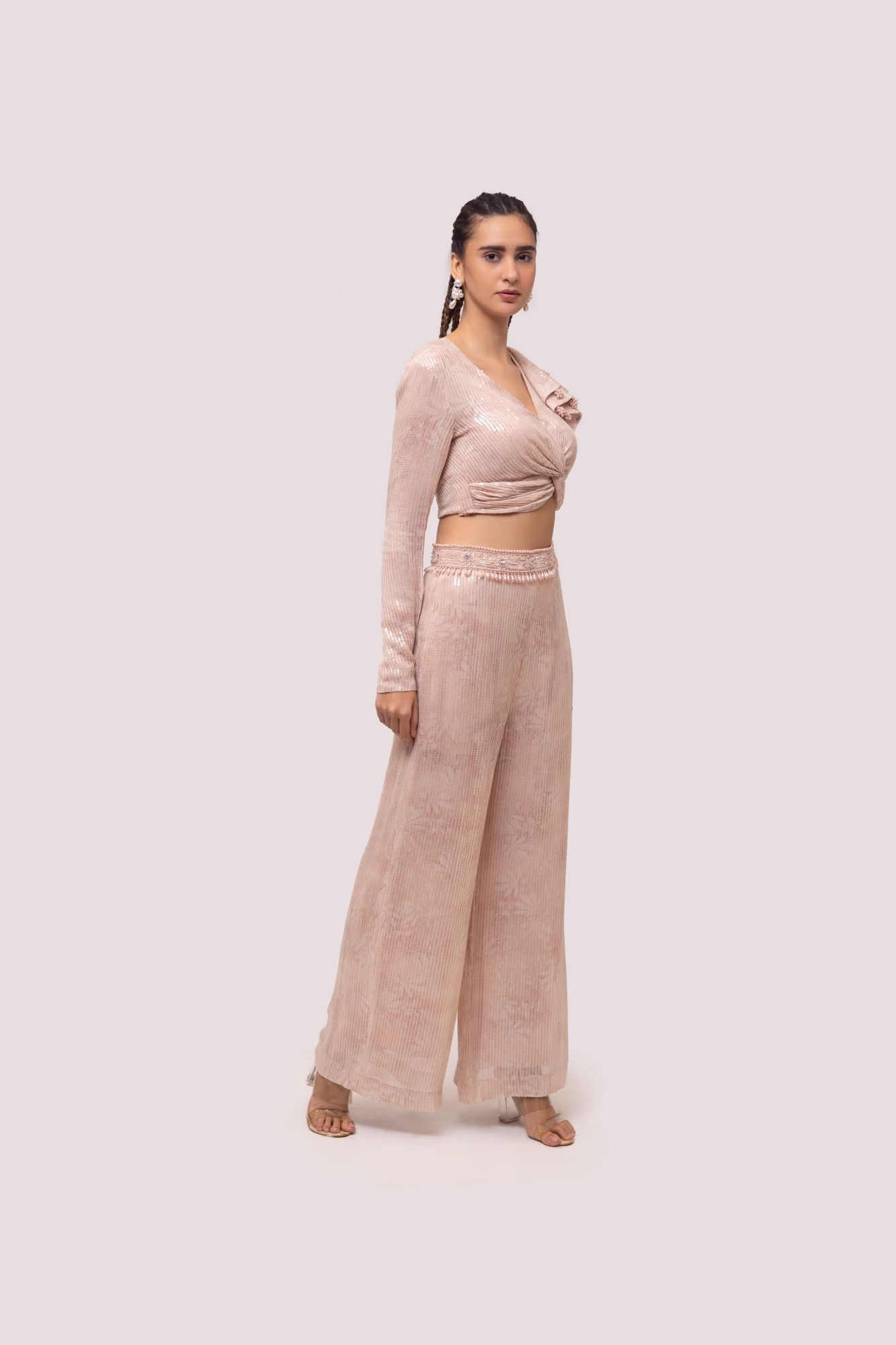 Buy peach contemporary sequinned co-ord set online in USA. Shop the best and latest designs in embroidered sarees, designer sarees, Anarkali suit, lehengas, sharara suits for weddings and special occasions from Pure Elegance Indian fashion store in USA.-side