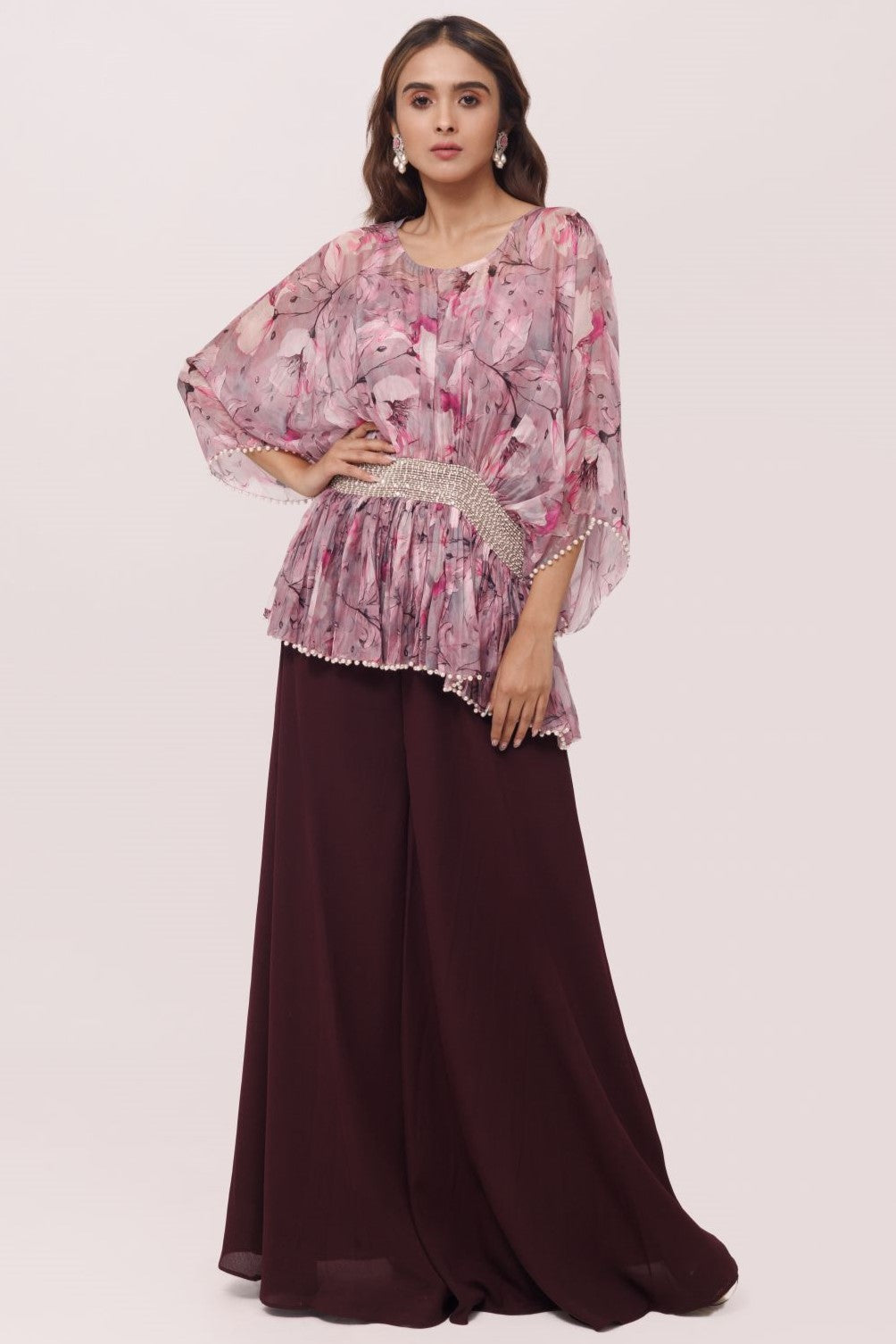 Shop stunning wine and pink printed top with palazzo online in USA. Shop the best and latest designs in embroidered sarees, designer sarees, Anarkali suit, lehengas, sharara suits for weddings and special occasions from Pure Elegance Indian fashion store in USA.-full view