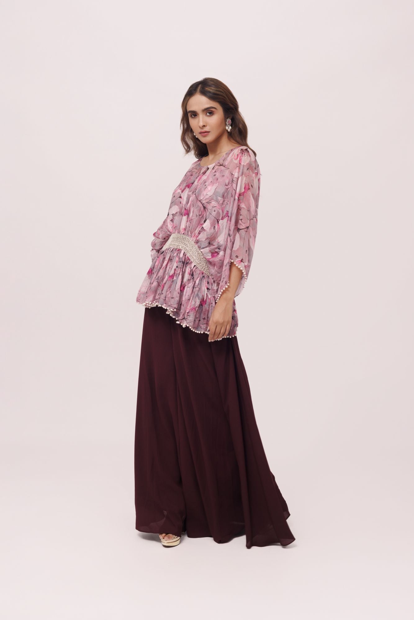Shop stunning wine and pink printed top with palazzo online in USA. Shop the best and latest designs in embroidered sarees, designer sarees, Anarkali suit, lehengas, sharara suits for weddings and special occasions from Pure Elegance Indian fashion store in USA.-palazzo