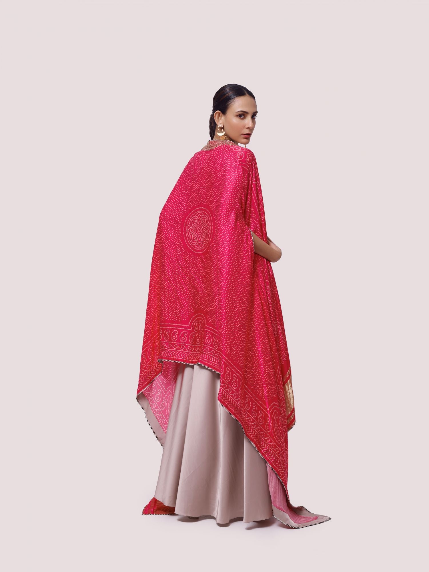 Buy beige satin maxi dress online in USA with pink embroidered cape. Shop the best and latest designs in embroidered sarees, designer sarees, Anarkali suit, lehengas, sharara suits for weddings and special occasions from Pure Elegance Indian fashion store in USA.-back