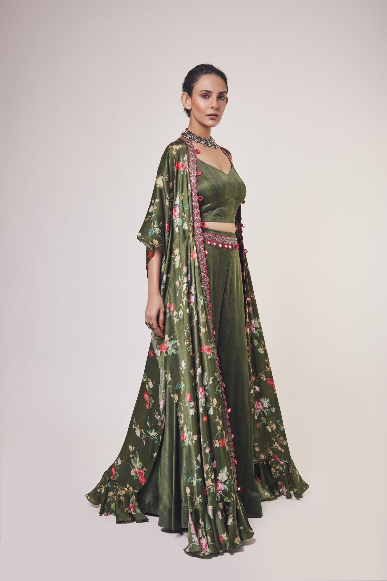 Buy mehendi green satin co-ord set online in USA with printed cape. Shop the best and latest designs in embroidered sarees, designer sarees, Anarkali suit, lehengas, sharara suits for weddings and special occasions from Pure Elegance Indian fashion store in USA.-cape