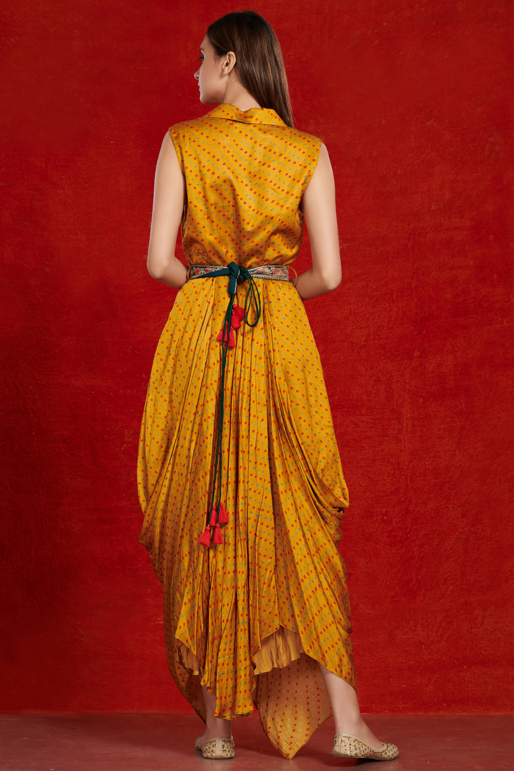 Buy beautiful mustard printed satin harem jumpsuit online in USA with embroidered belt. Shop the best and latest designs in embroidered sarees, designer sarees, Anarkali suit, lehengas, sharara suits for weddings and special occasions from Pure Elegance Indian fashion store in USA.-back
