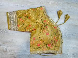 Buy mustard floral blouse with sequin embroidered edges and written ayushmati bhav. Make a fashion statement on festive occasions and weddings with designer blouses, designer sarees, designer suits, Indian dresses, designer gowns, sharara suits, and embroidered sarees from Pure Elegance Indian fashion store in the USA.