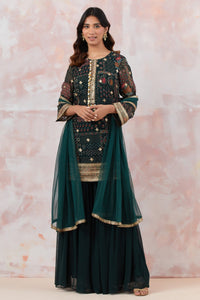 Buy Bottle green sharara set featuring Kurta with foil work, shells, and coin detailing, also plain sharara  It is best for occasions & parties. Dazzle on weddings and special occasions with exquisite Indian designer dresses, sharara suits, Anarkali suits, and wedding lehengas from Pure Elegance Indian fashion store in the USA.