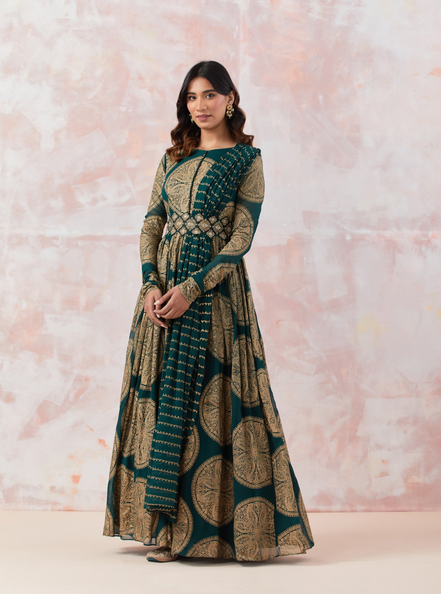 Buy green stylish georgette Anarkali set featuring an all-over foil print, that comes with a pearl embroidery belt. Dazzle on weddings and special occasions with exquisite Indian designer dresses, sharara suits, Anarkali suits, and wedding lehengas from Pure Elegance Indian fashion store in the USA.