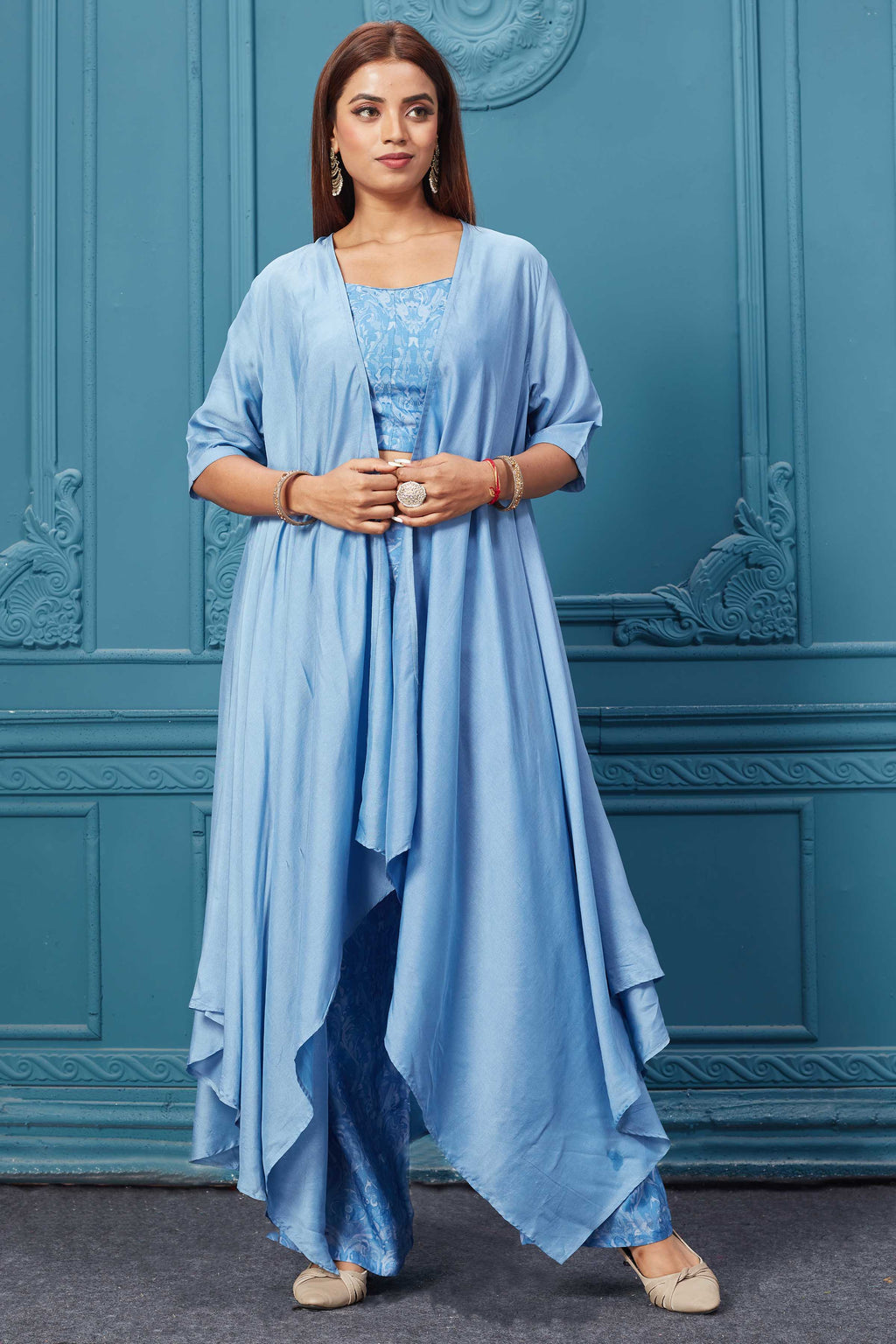 Buy this Gorgeous sky blue suit set with embroidery. Featuring beautiful pants, a blouse, and a stylish jacket. Shop Indian dresses, gowns, designer lehengas, and sarees online at Pure Elegance or visit our store in the USA.