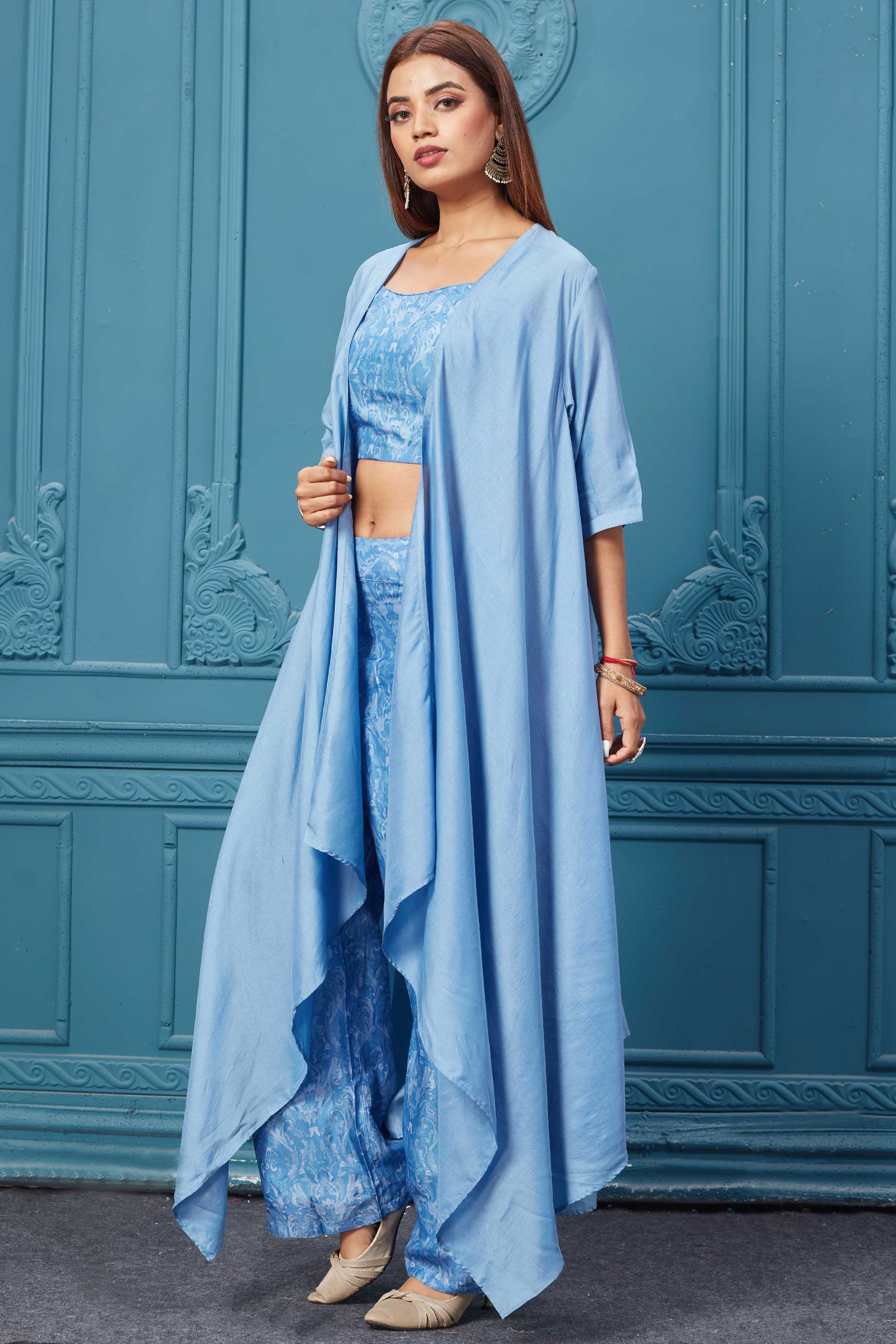 Buy this Gorgeous sky blue suit set with embroidery. Featuring beautiful pants, a blouse, and a stylish jacket. Shop Indian dresses, gowns, designer lehengas, and sarees online at Pure Elegance or visit our store in the USA.