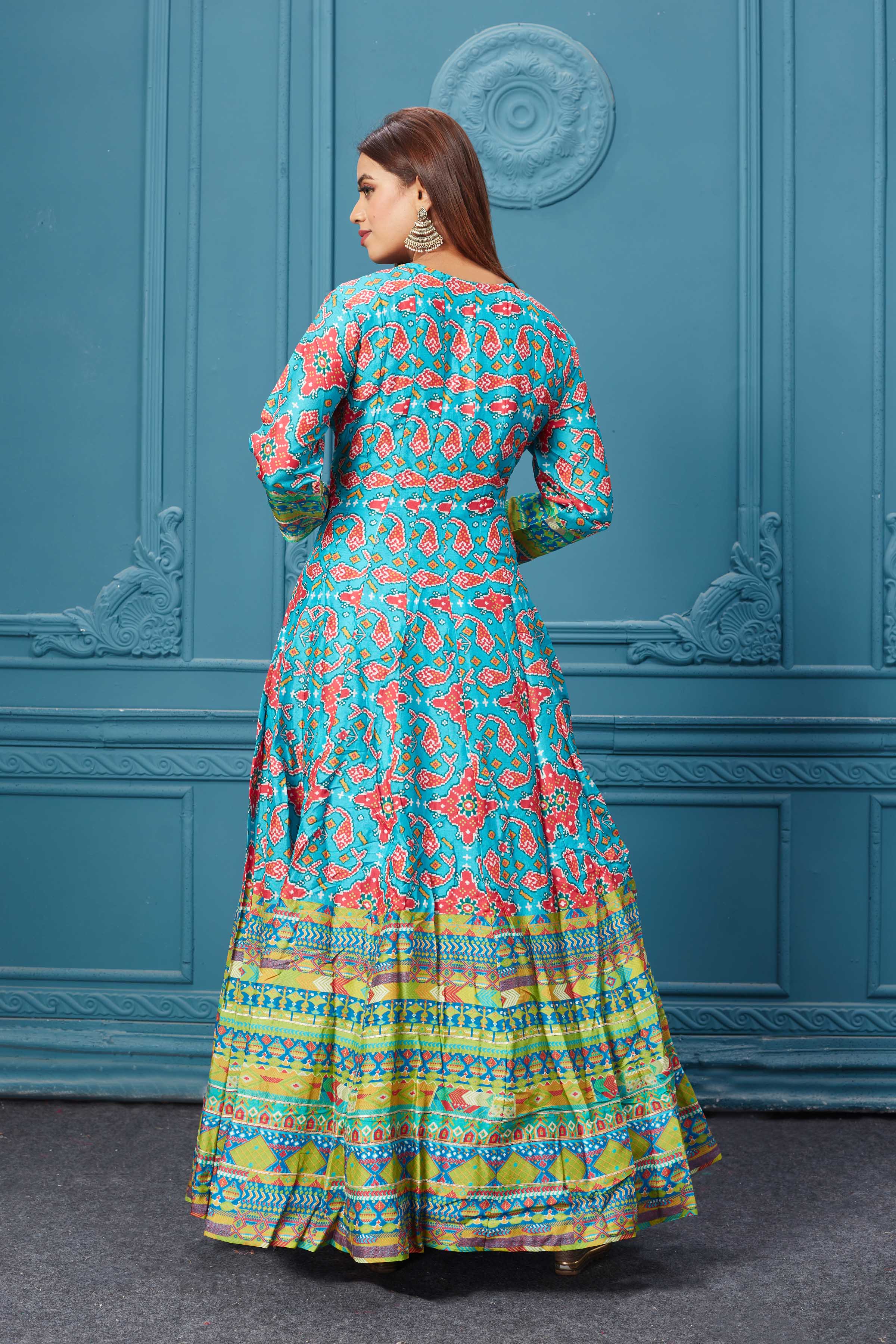 Buy a beautiful light blue & green embroidered silk Anarkali suit. Shop online from Pure Elegance. Dazzle on weddings and special occasions with exquisite Indian designer dresses, sharara suits, Anarkali suits, and wedding lehengas from Pure Elegance Indian fashion store in the USA.
