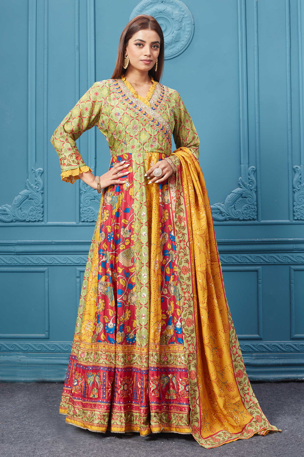 Buy a Beautiful yellow embroidered silk Anarkali suit with a dupatta. Shop online from Pure Elegance. Dazzle on weddings and special occasions with exquisite Indian designer dresses, sharara suits, Anarkali suits, and wedding lehengas from Pure Elegance Indian fashion store in the USA.