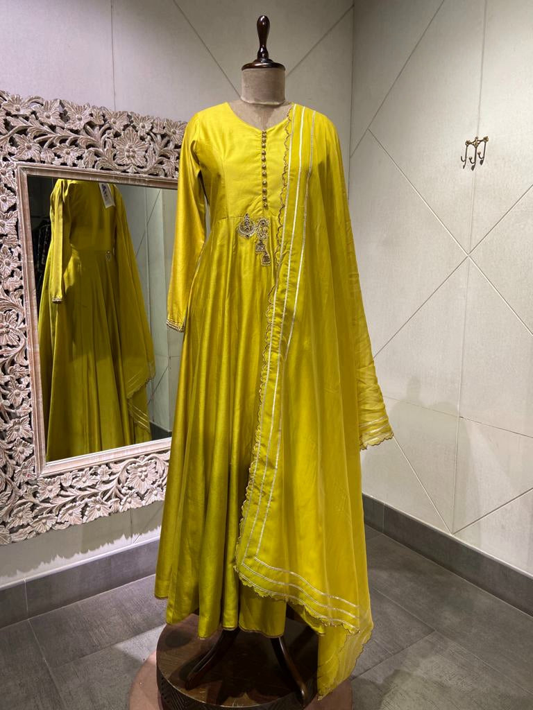 Shop pista green chanderi silk Anarkali suit online in USA with dupatta. Look your best on festive occasions in latest designer saris, pure silk saris, Kanchipuram silk sarees, handwoven saris, tussar silk sarees, designer suits, lehengas from Pure Elegance Indian clothing store in USA.-full view