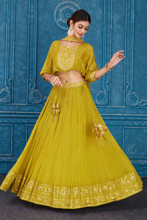 Buy olive green embroidered georgette lehenga online in USA with dupatta. Slay in style at wedding festivities in this beautiful designer lehengas. hand embroidered lehengas, Bollywood lehenga, Anarkali suits, sharara suits from Pure Elegance Indian saree store in USA. -skirt